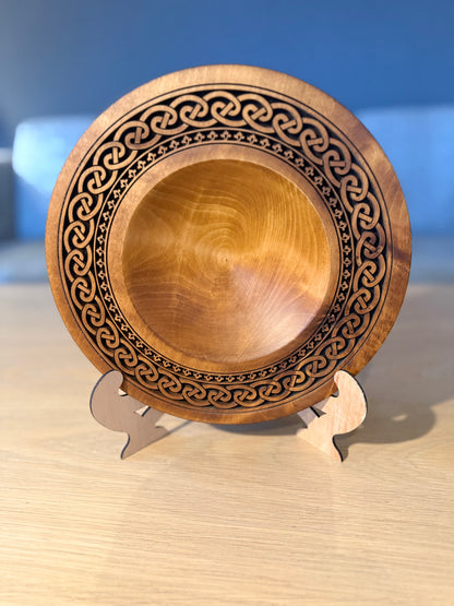 Turned teak-colored platter with Celtic border