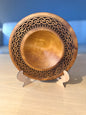 Turned teak-colored platter with Celtic border