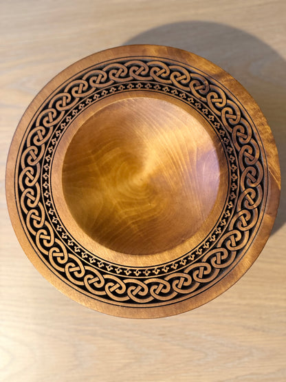 Turned teak-colored platter with Celtic border